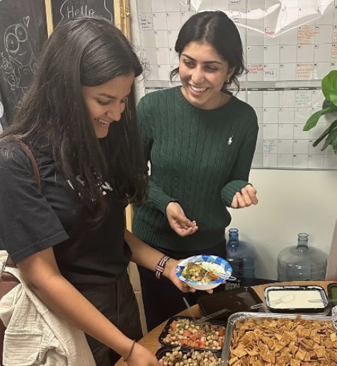 Students enjoy food at the Chai and Cha(a)t event